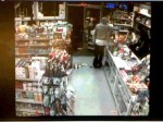 Suspect Sought in Liquor Store Robbery