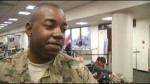 Hugs, Tears Greet Guard Members at LAX